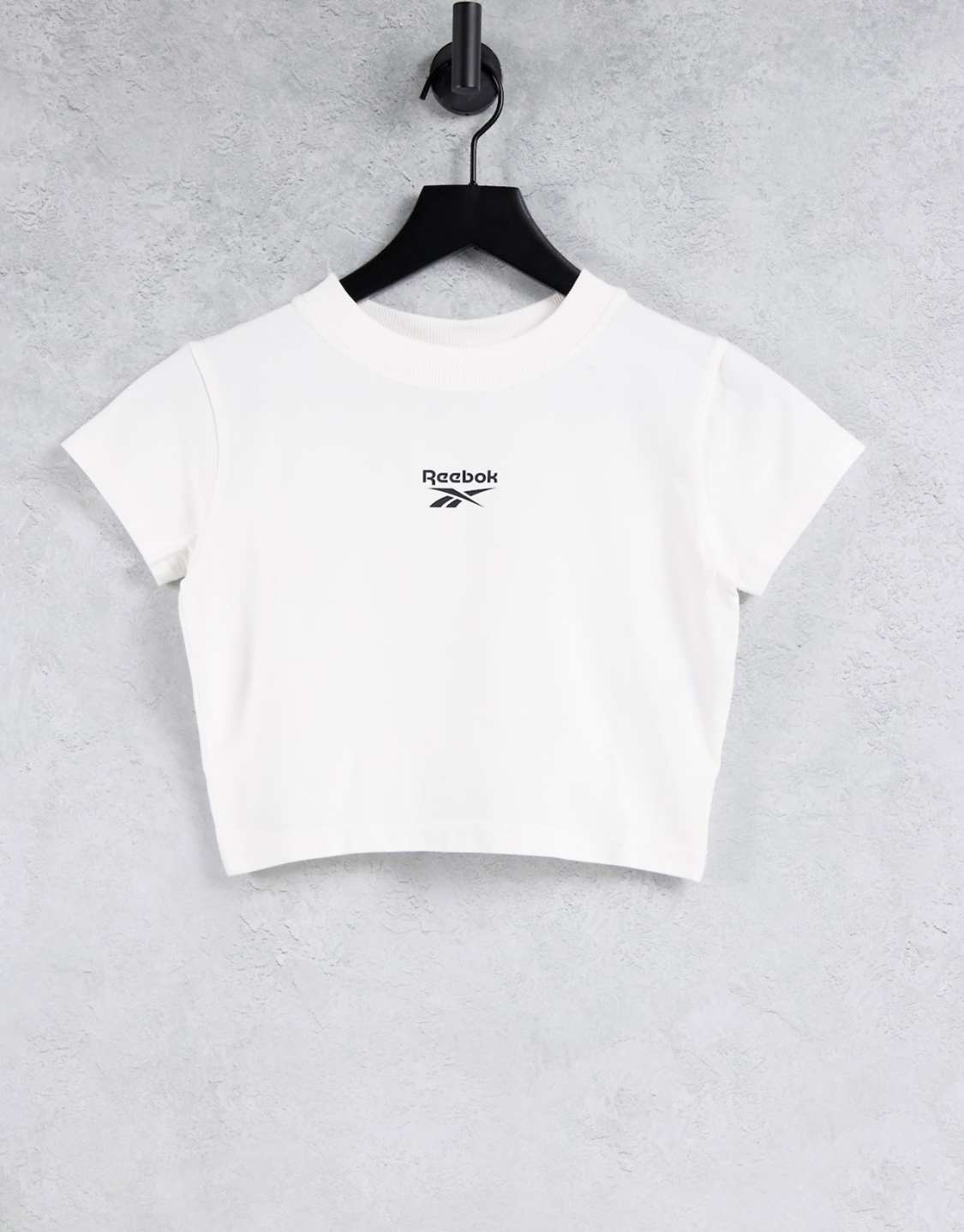 Reebok small central logo super cropped high neck t-shirt in white