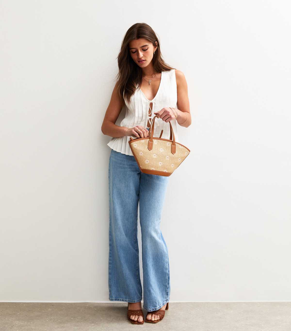 White Pleated Tie Front Sleeveless Top