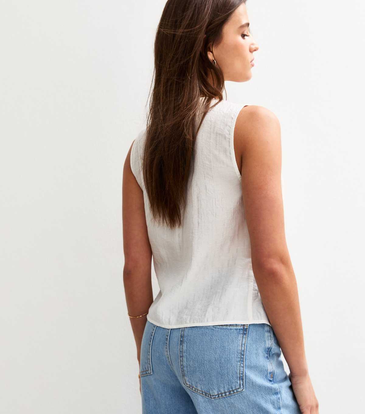 White Pleated Tie Front Sleeveless Top