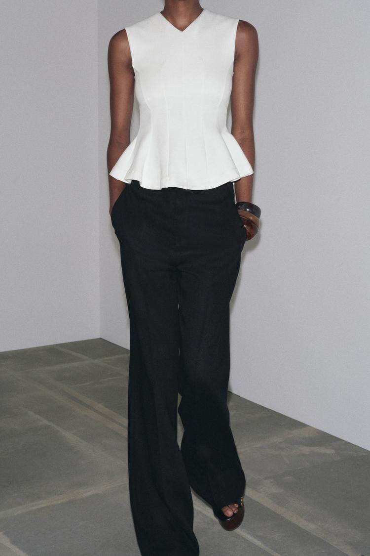 Sleeveless Interlock Peplum Top