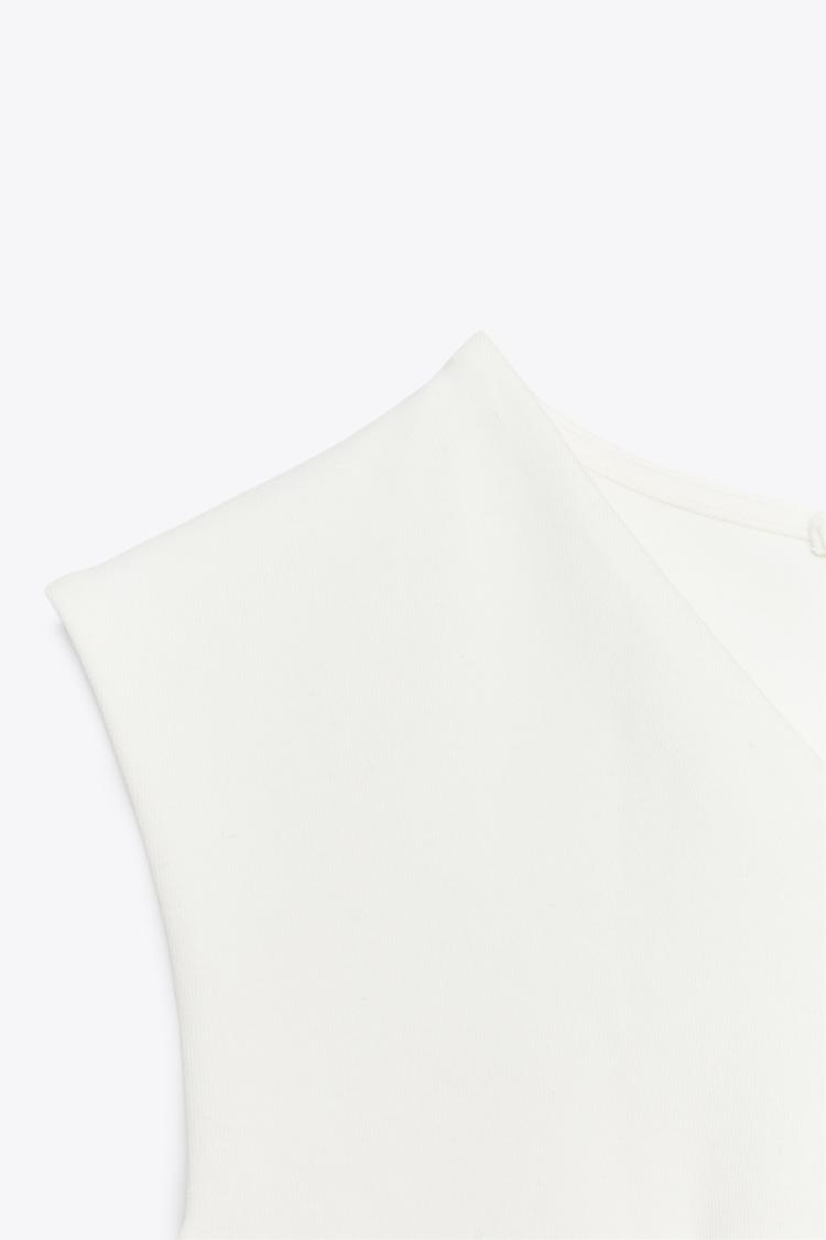 Sleeveless Interlock Peplum Top