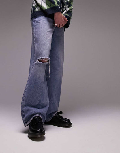 Baggy Ripped Jeans in mid wash blue