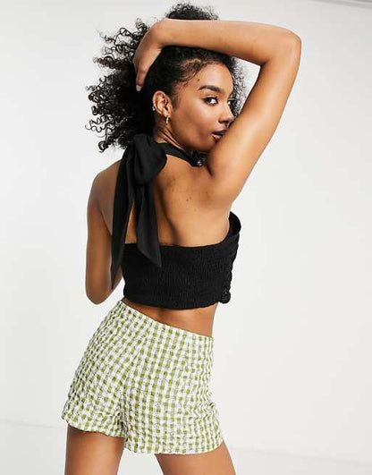 ASOS DESIGN natural crinkle halter top with shirred waist in black