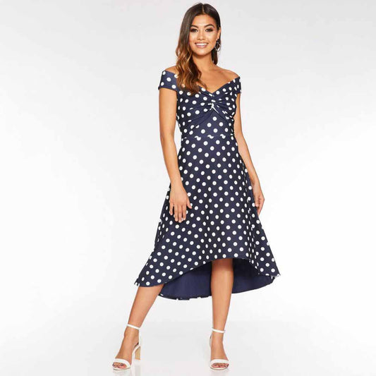 Navy Polka Dot Dip Hem Dress