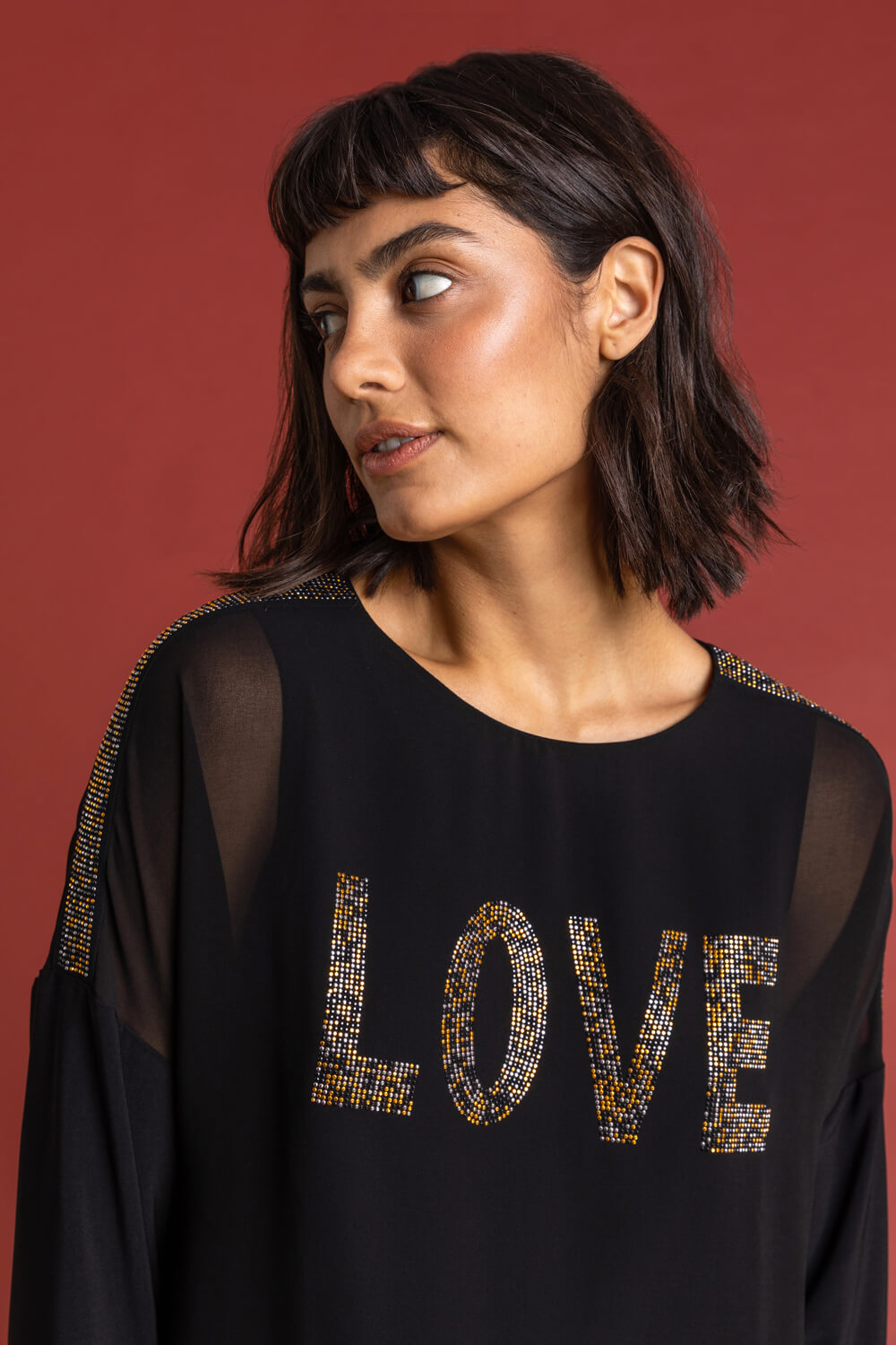 Black Asymmetric Love Embellished Top