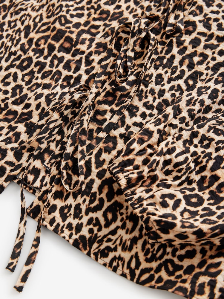 Leopard Tie Front Long Sleeve Top