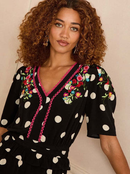 Black Polka Dot Embroidered V-Neck Peplum Mini Dress