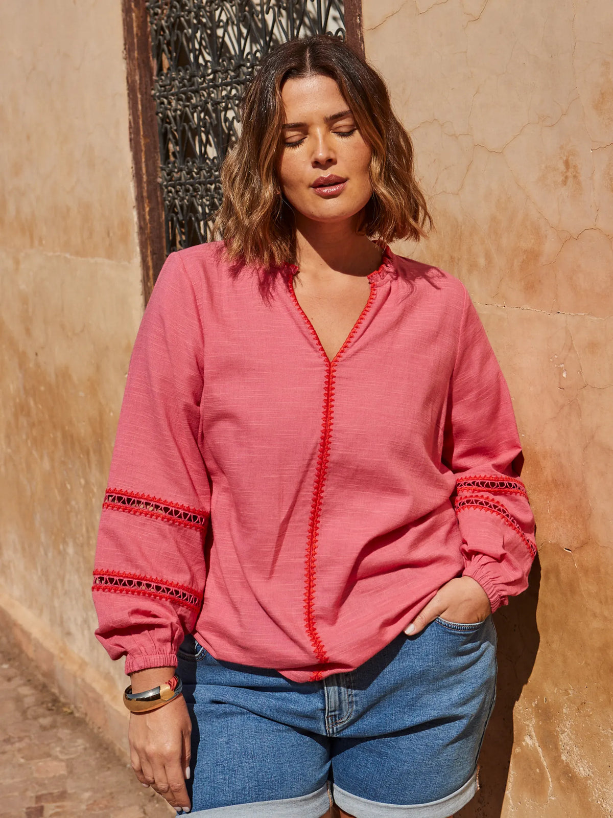 Pink Blouse With Red Trim Detail