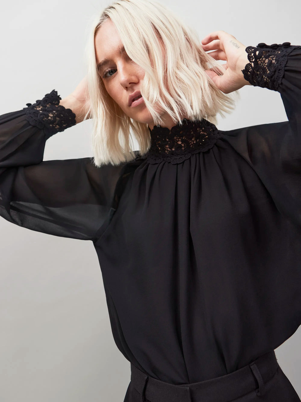 Black Lace Trim Bubble Hem Blouse
