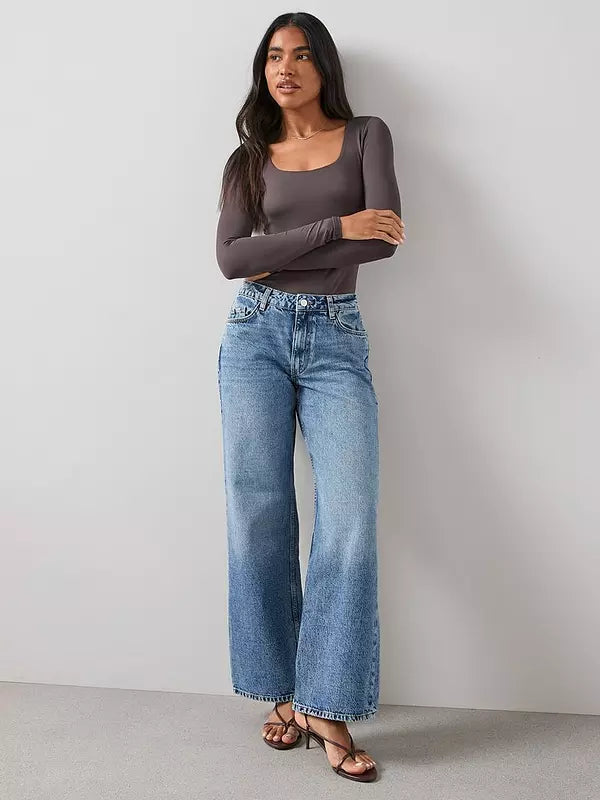 Mid Wash Blue Low Rise Baggy Jeans