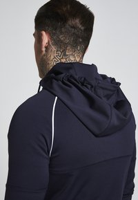 Zonal Zip Through Track Top Navy