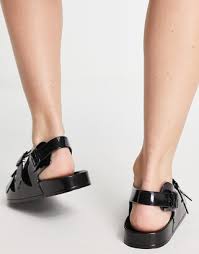 ASOS DESIGN Fate jelly flat sandals with buckles in black