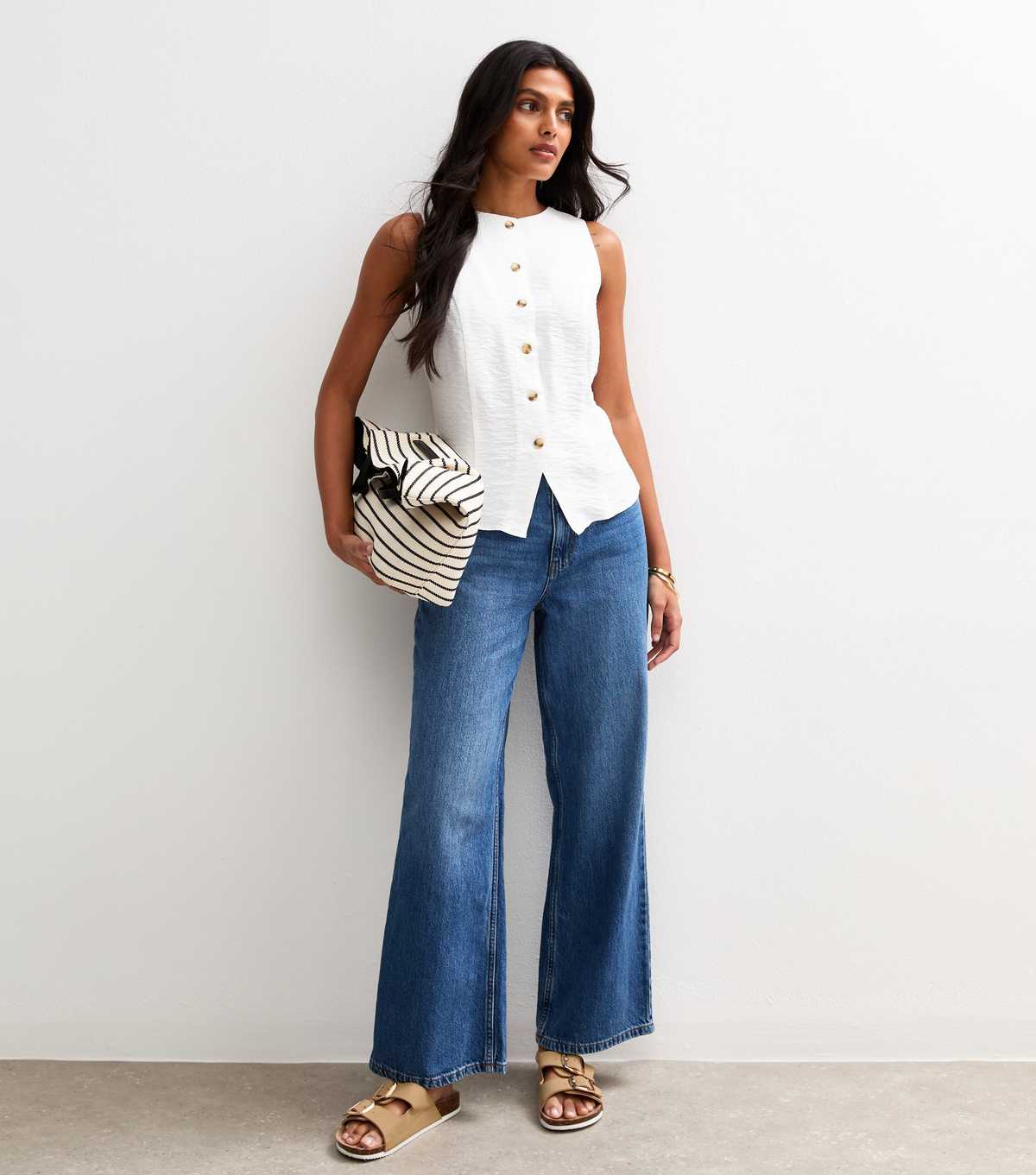 White Sleeveless Crew Neck Waistcoat